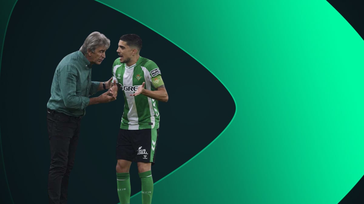 Pellegrini dando instrucciones a Bartra, Capitán del Real Betis.