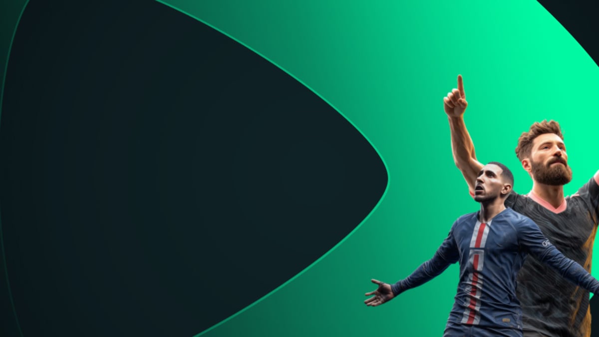 Junior Firpo del Real Betis sosteniendo un móvil con el símbolo de speedyBet.